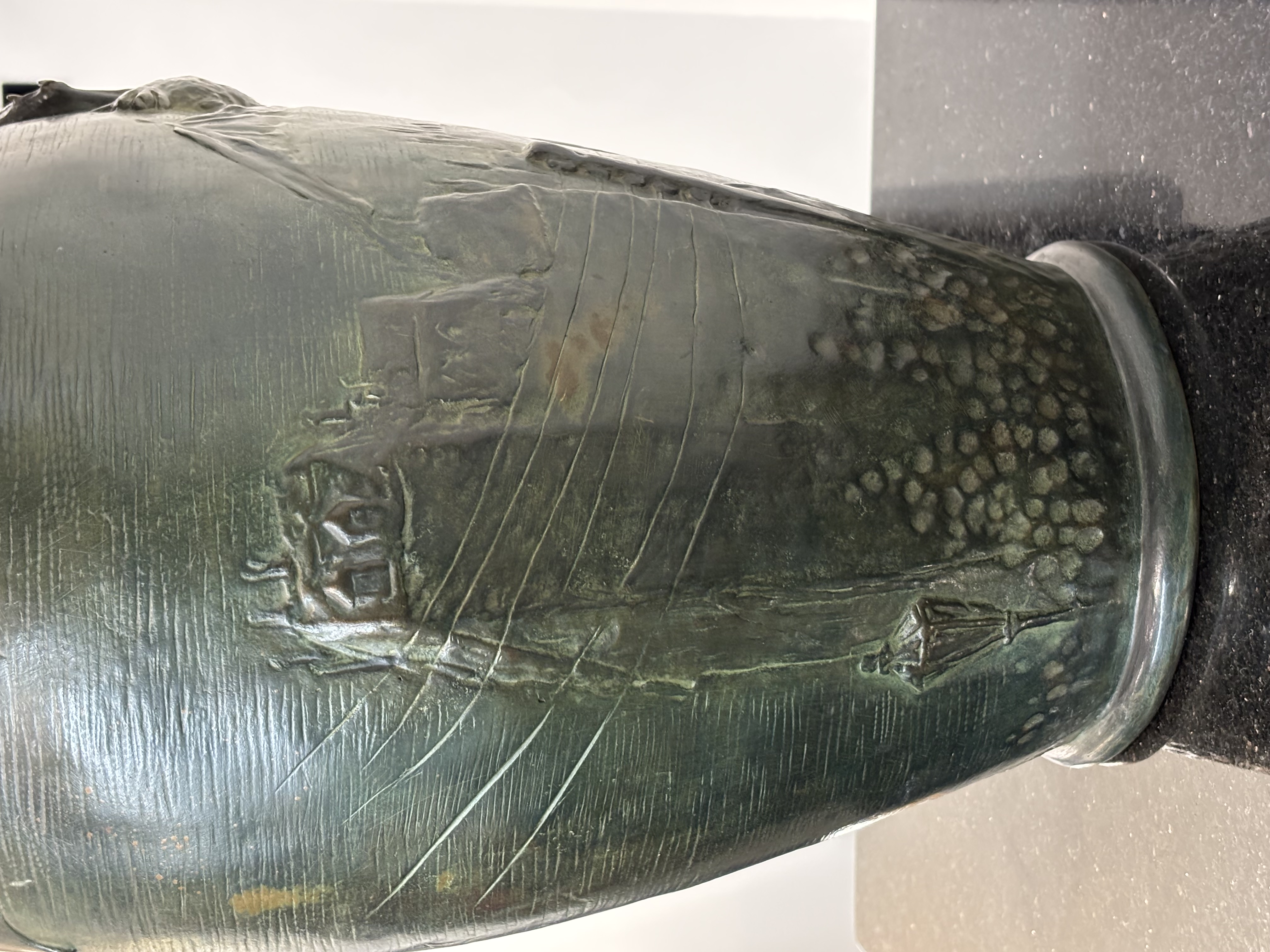 Vase Decorated With Bats in Flight Among Evening Clouds
