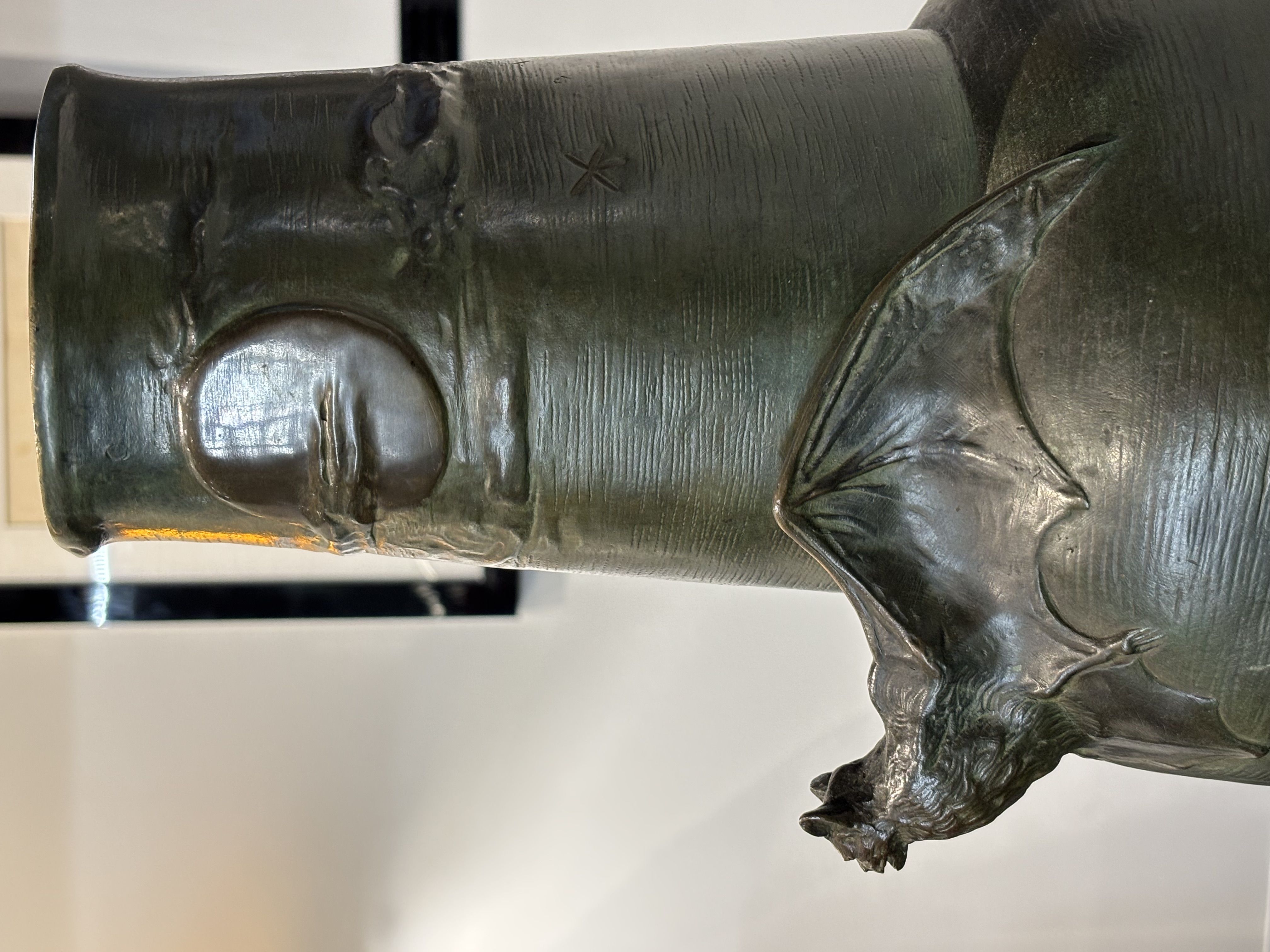 Vase Decorated With Bats in Flight Among Evening Clouds