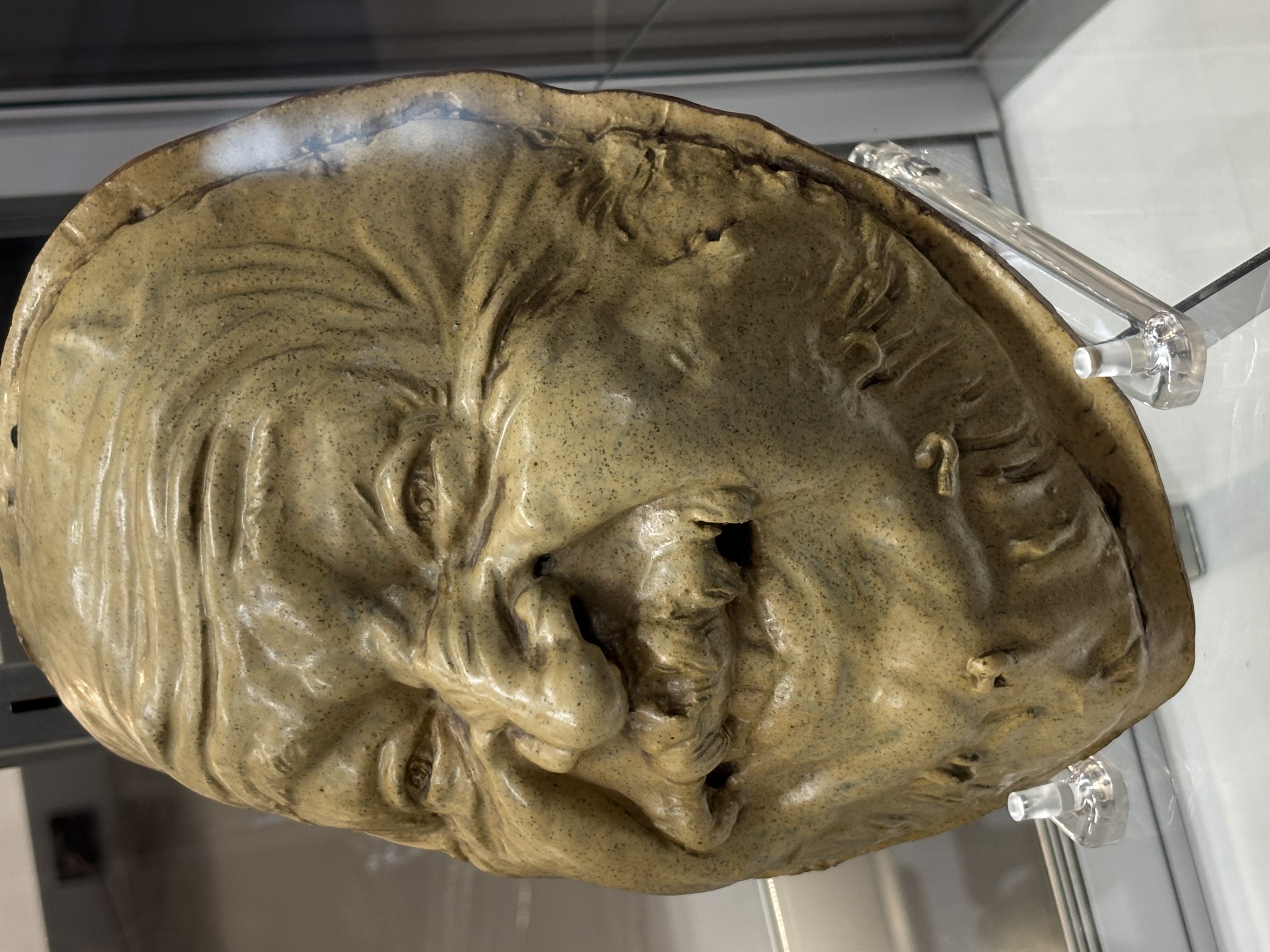 Jean Joseph Marie Carries Earthenware Mask