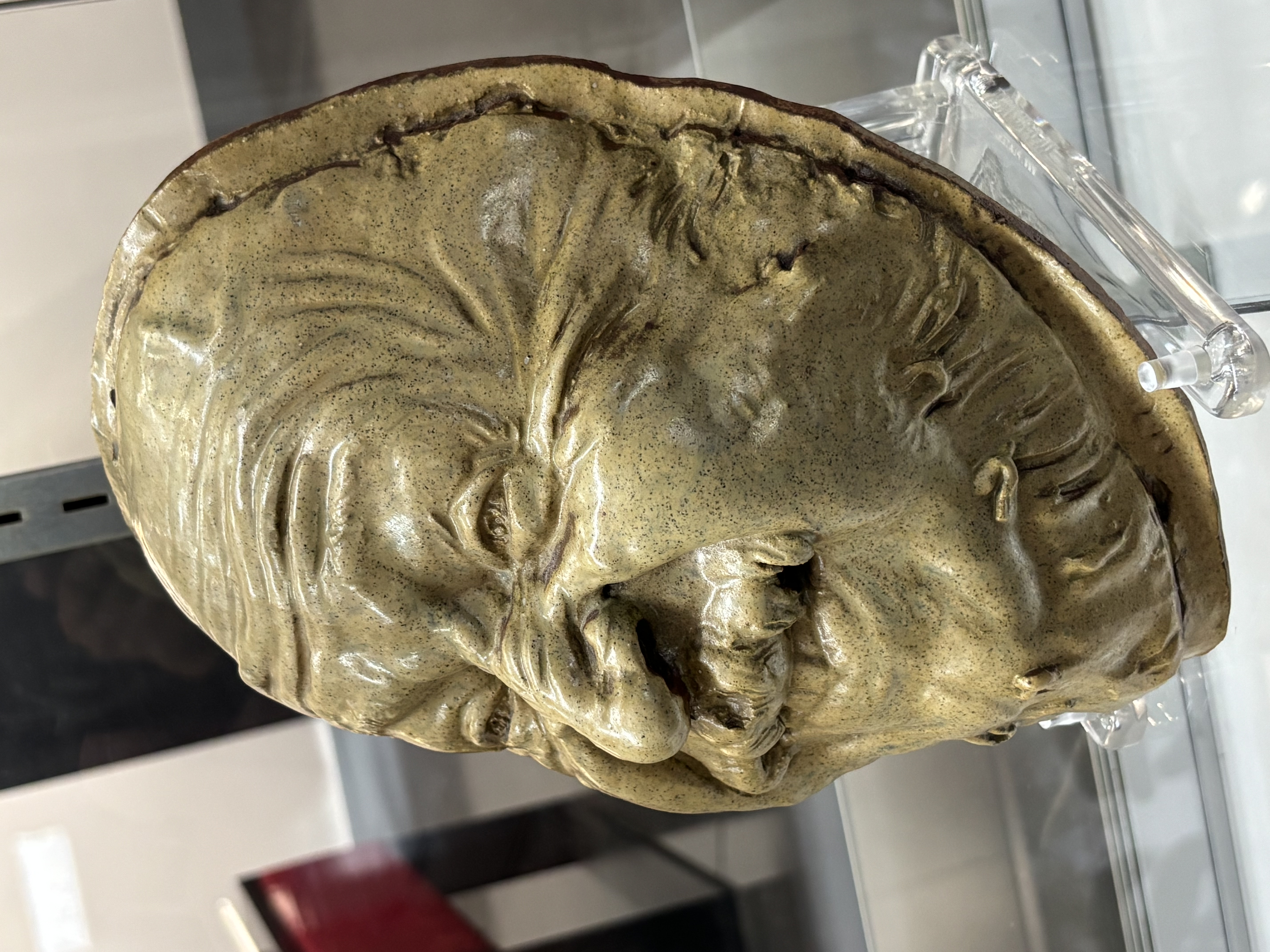 Jean Joseph Marie Carries Earthenware Mask